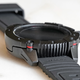 Heatsinks that facilitate the watch’s power system are cleverly camouflaged as part of its rugged design.